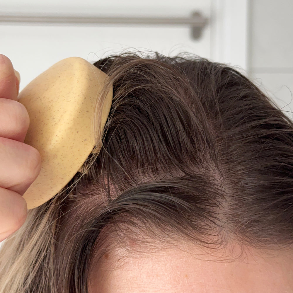 In use branded scalp massager